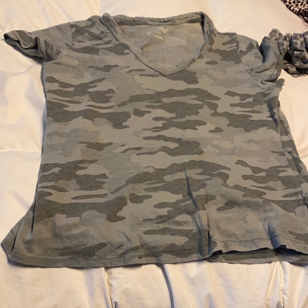 Size medium shirt. Has been worn